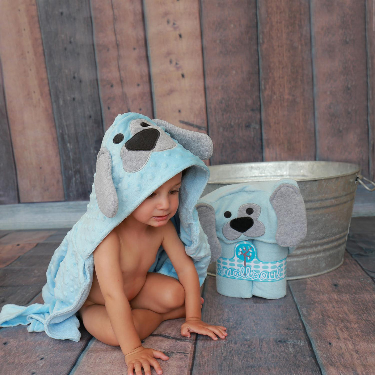 Children's towel in the shape of a blue dog, one size fits all